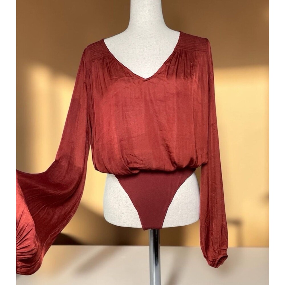 Free People Intimately NWOT burgundy long balloon sleeve womens bodysuit sz XS